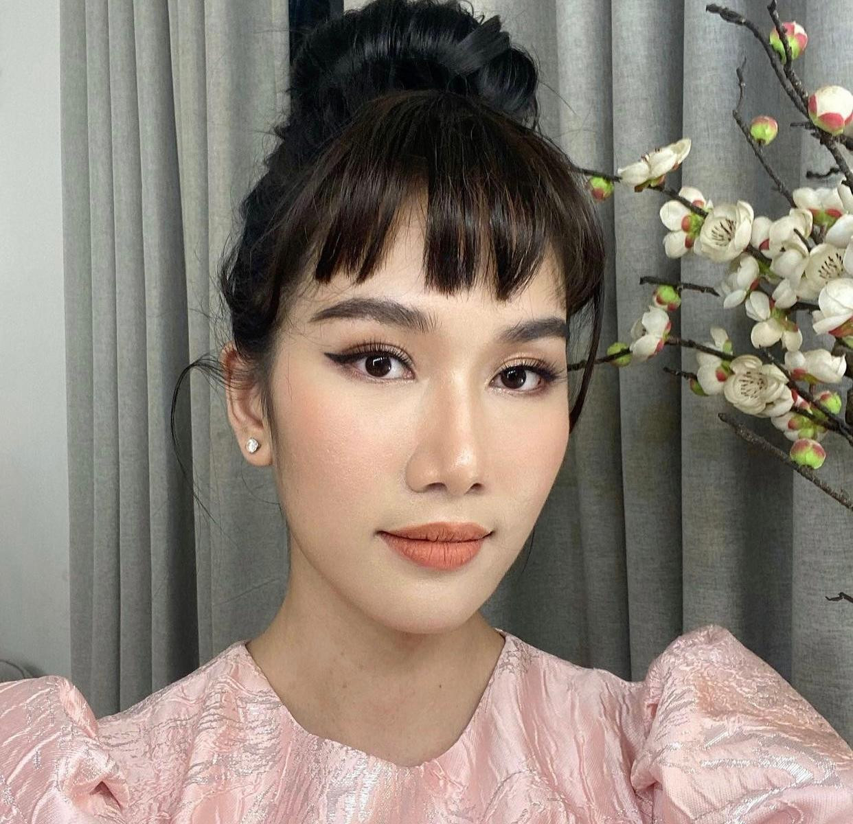 Á hậu Phương Anh xinh đẹp và mới mẻ với tóc mái kiêu kỳ.