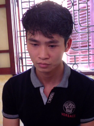 Trần Văn Dũng tại Công an quận Tây Hồ. Ảnh: PB