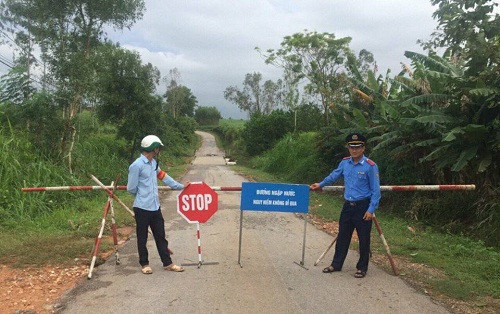 Mưa lớn ở Nghệ An: Quốc lộ bị chia cắt, có nơi ngập sâu 1m ảnh 1