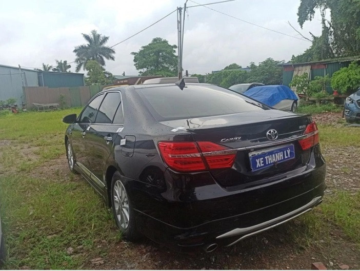 Tài sản đảm bảo là xe ô tô tại một bãi giữ xe ở phố Linh Đường (Hoàng Mai, Hà Nội) do một ngân hàng thu giữ từ khách vay.