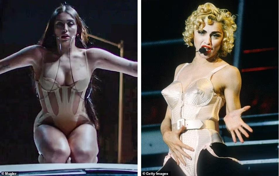 Bộ trang phục biểu diễn của người đẹp 25 tuổi khiến truyền thông quốc tế liên tưởng đến hình ảnh của &quot;Nữ hoàng nhạc Pop&quot; vào những năm 1990.