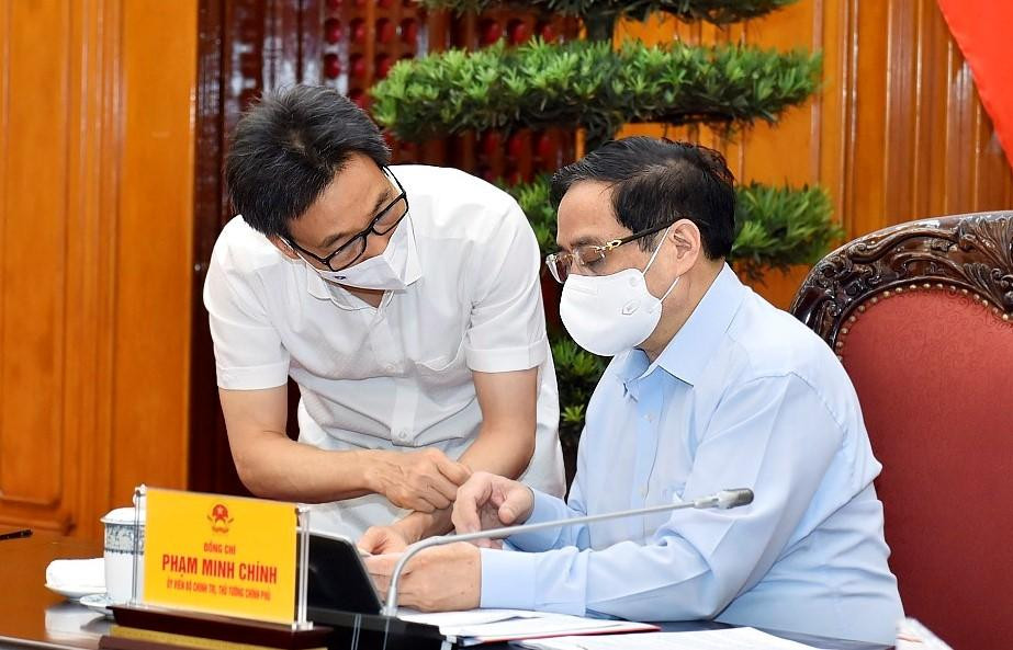 Thủ tướng Phạm Minh Chính và Phó Thủ tướng Vũ Đức Đam tại cuộc làm việc với Bộ Y tế (ảnh Nhật Bắc)