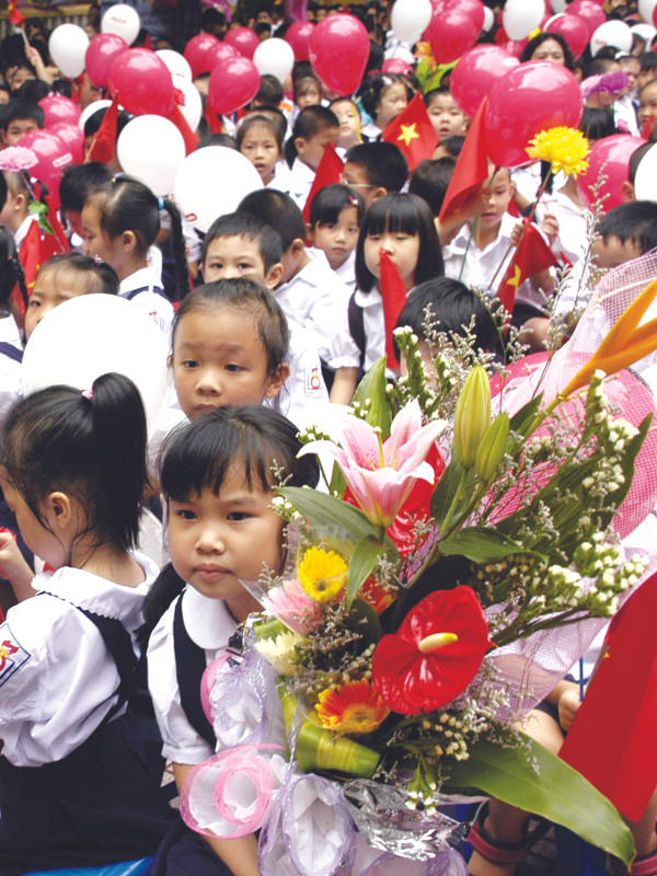 Trẻ nhỏ ở Hà Nội trong ngày đầu tiên vào lớp 1.	Ảnh: Phạm Yên