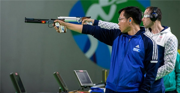 Hoàng Xuân Vinh để tuột HCV trong hai phát súng cuối ảnh 8