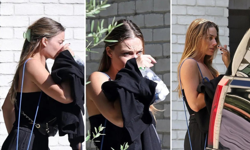 Biểu cảm kỳ lạ của Margot Robbie sau khi rời khỏi nhà Cara đã đặt ra dấu hỏi lớn về những gì cô đã chứng kiến. Biểu cảm kỳ lạ của Margot Robbie sau khi rời khỏi nhà Cara đã đặt ra dấu hỏi lớn về những gì cô đã chứng kiến.