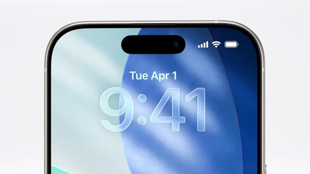 Cận cảnh Liquid Glass tương tác trên màn hình khoá với giao diện ánh sáng chuyển sắc và thanh điều hướng mờ ảo. (Ảnh: Apple) Cận cảnh Liquid Glass tương tác trên màn hình khoá với giao diện ánh sáng chuyển sắc và thanh điều hướng mờ ảo. (Ảnh: Apple)