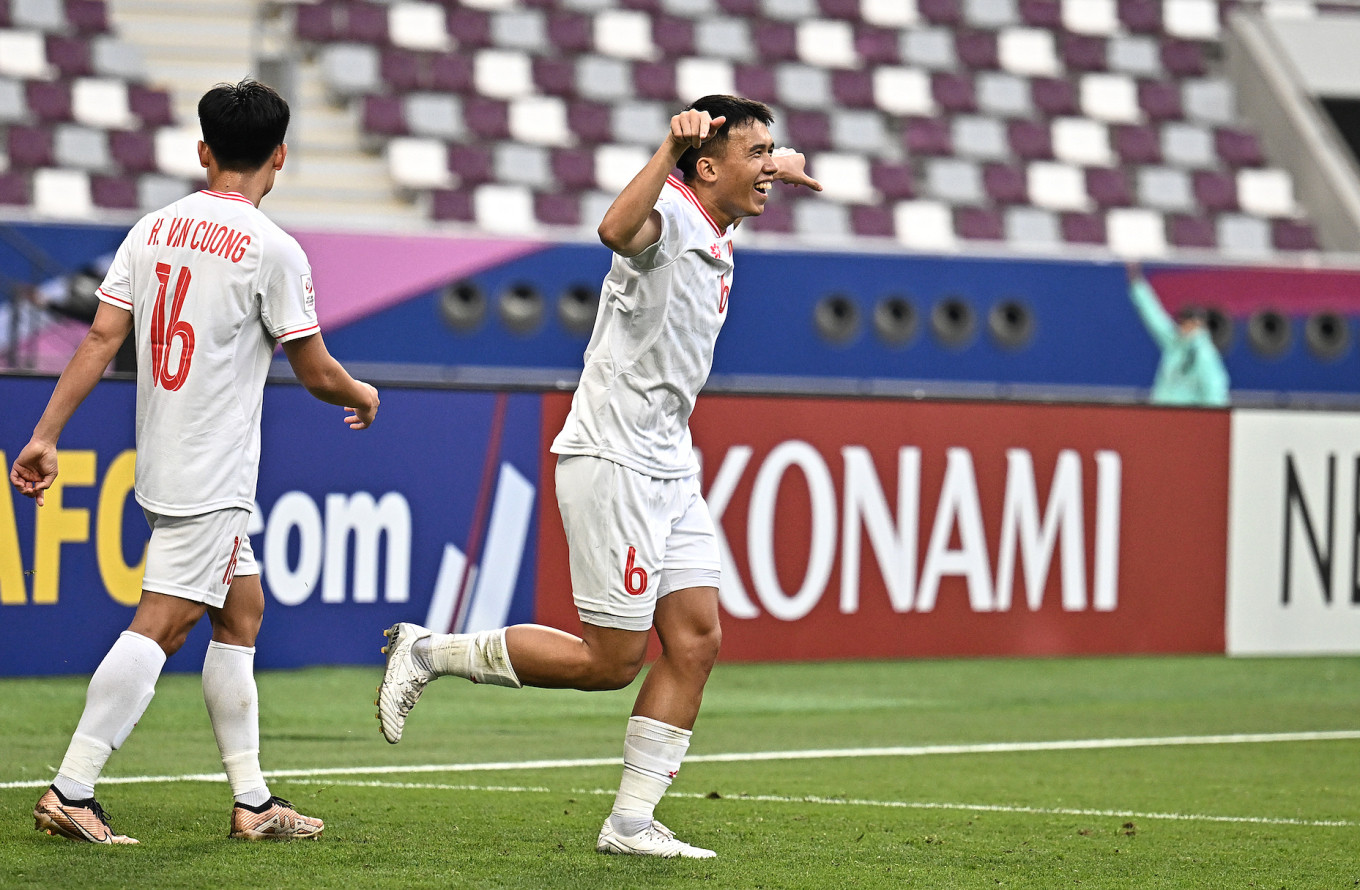 Tiền vệ Võ Hoàng Minh Khoa (phải) mừng bàn ấn định tỷ số 2-0 cho U23 Việt Nam trước U23 Malaysia. (Ảnh: AFC) Tiền vệ Võ Hoàng Minh Khoa (phải) mừng bàn ấn định tỷ số 2-0 cho U23 Việt Nam trước U23 Malaysia. (Ảnh: AFC)
