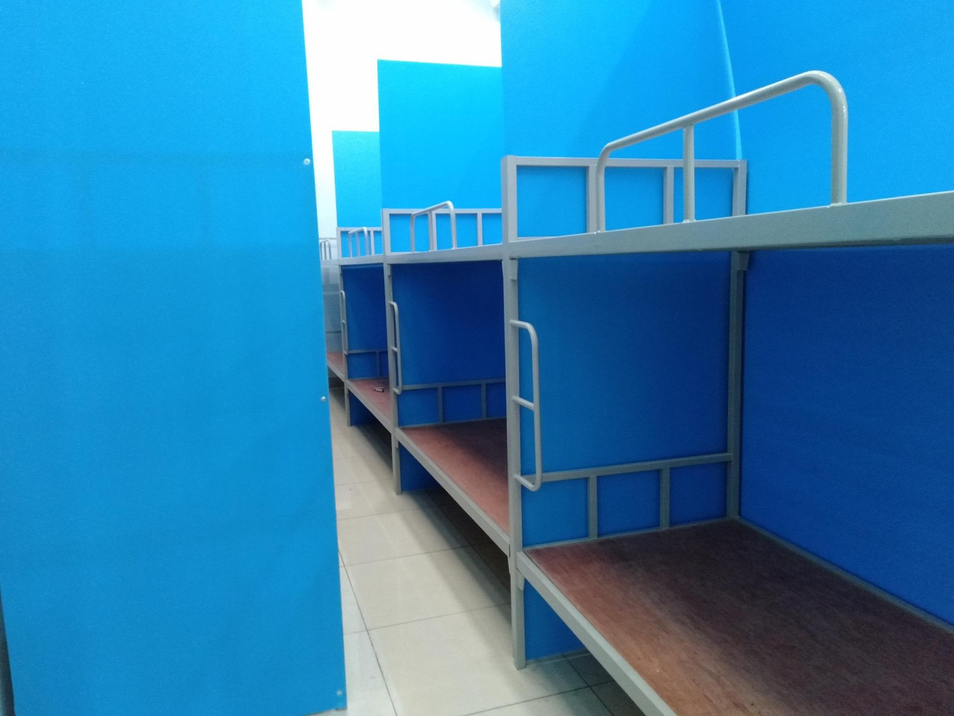 Tại Shihlin Vsip - Bắc Ninh, công nhân viên được bố trí vách ngăn, giường tầng. (Ảnh: Lê Bích Hồng) Tại Shihlin Vsip - Bắc Ninh, công nhân viên được bố trí vách ngăn, giường tầng. (Ảnh: Lê Bích Hồng)