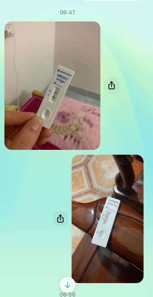 Hình ảnh chụp que test nhanh với kết quả "2 vạch" xuất hiện khắp mạng xã hội.