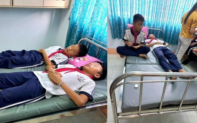 Nhiều em học sinh ở trường Tiểu học Tân Thành B, tỉnh Bình Phước, có dấu hiệu ngộ độc sau khi ăn kẹo mua trước cổng trường. Nhiều em học sinh ở trường Tiểu học Tân Thành B, tỉnh Bình Phước, có dấu hiệu ngộ độc sau khi ăn kẹo mua trước cổng trường.