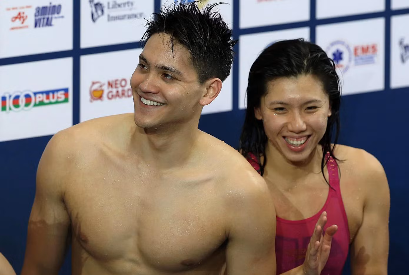 Schooling và nữ VĐV Amanda Lim. (Ảnh: The Straits Times)