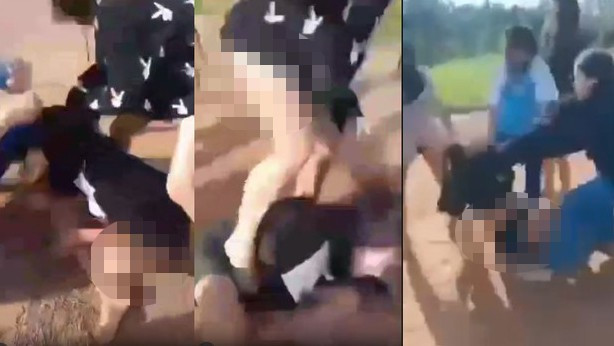 Thiếu nữ bị nhóm bạn đánh hội đồng, lột đồ. (Ảnh cắt từ clip)