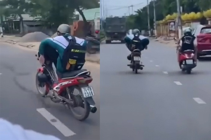 Nam sinh điều khiển xe bằng chân, chạy băng băng trên đường. (Ảnh cắt từ clip)