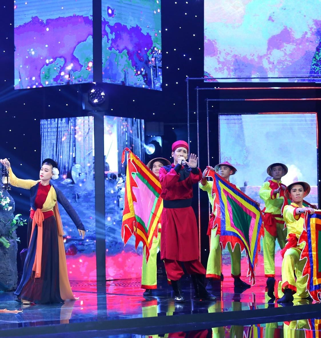 Tấn Đạt với tiết mục "Hòn vọng phu" tại sân khấu "Người kể chuyện tình"