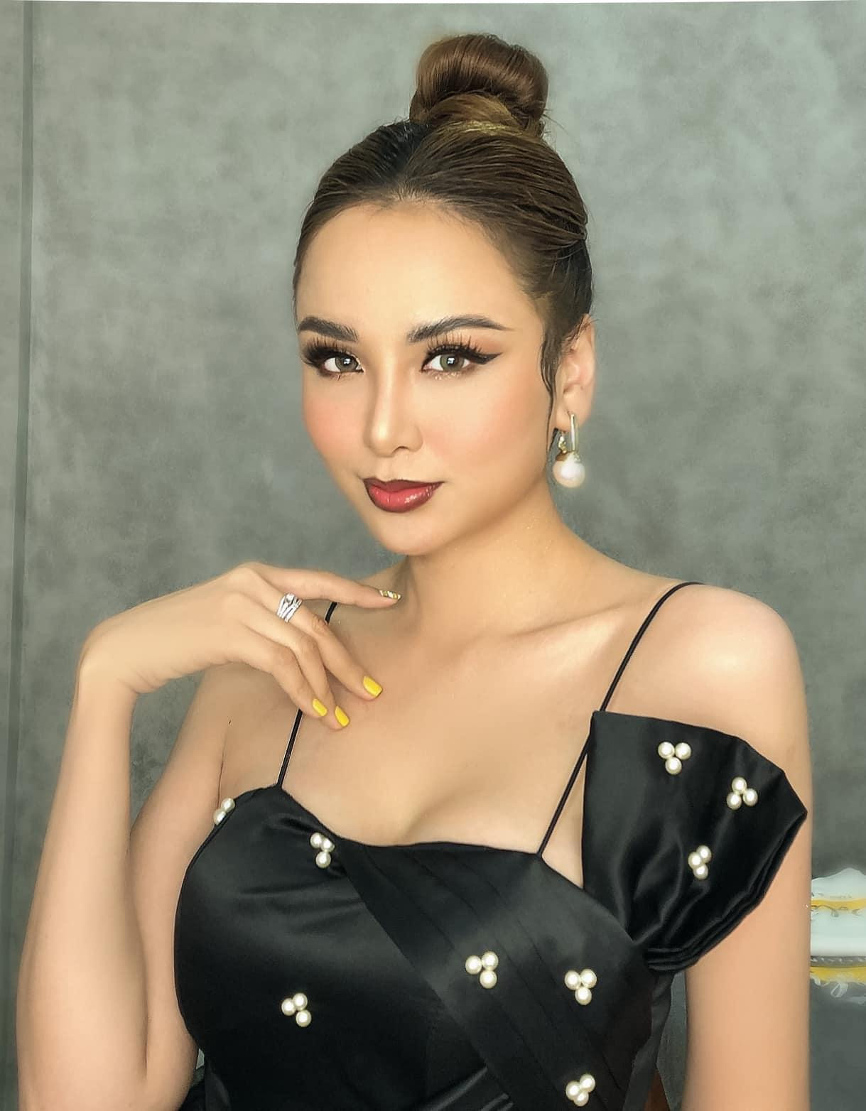 Hoa hậu Diễm Hương kiêu sa, yêu kiều trong bộ váy đen có thiết kế lạ mắt.