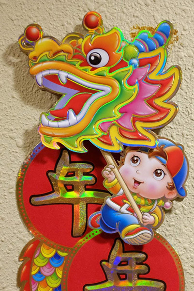 Người dân Singapore đón tết Nhâm Thìn 2012. Ảnh: Chinadaily