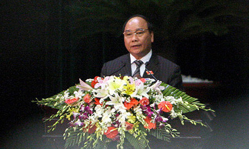 Phó Thủ tướng Nguyễn Xuân Phúc trình bày báo cáo trước Quốc hội. Ảnh: Việt Hưng (Dân Trí)