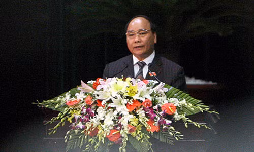 Phó Thủ tướng Nguyễn Xuân Phúc trình bày báo cáo trước Quốc hội. Ảnh: Việt Hưng (Dân Trí)