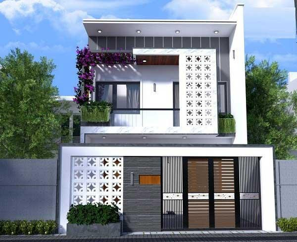 Đây là thiết kế với phần mặt tiền 7mm2. Phần tường rào và rìa phải ban công được điêu khắc hoa văn rất tỉ mỉ, công phu. Tông màu trắng chủ đạo kết hợp những viền đen khỏe khoắn của cửa gợi cảm giác hài hòa, bắt mắt.