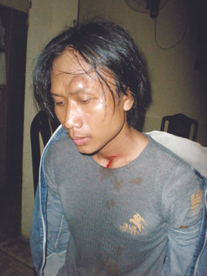 Hung thủ sau khi bị bắt giữ