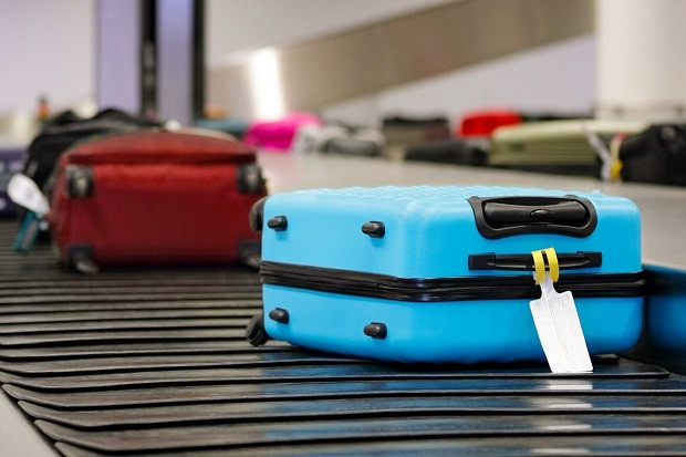 Cảng HKQT Nội Bài khuyến cáo hành khách nên gắn tên kèm số điện thoại hoặc các dấu hiệu dễ nhận biết lên hành lý ký gửi và hành lý xách tay khi đi máy bay. Ảnh: VNB.