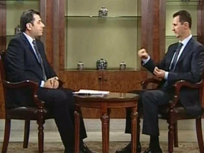 Tổng thống Syria Assad (phải) đang trả lời phỏng vấn của Al Dunya TV. Ảnh: Ria-Novosti