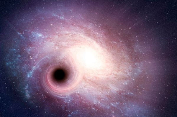 Sau khi "xoay người" thì lỗ đen "siêu khổng lồ" hướng thẳng về Trái Đất. Ảnh: Science Photo Library RF/ Getty. Sau khi "xoay người" thì lỗ đen "siêu khổng lồ" hướng thẳng về Trái Đất. Ảnh: Science Photo Library RF/ Getty.