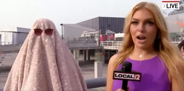 Lên TV thế này nhưng sếp vẫn không thể nhận ra đâu. Ảnh: WKRC. Lên TV thế này nhưng sếp vẫn không thể nhận ra đâu. Ảnh: WKRC.