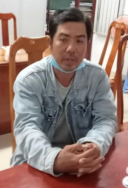 Đương tại cơ quan công an. (Ảnh do công an cung cấp).