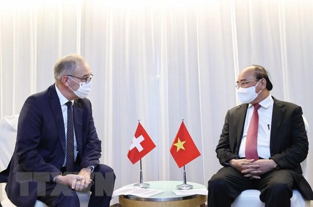 Chủ tịch nước Nguyễn Xuân Phúc gặp Tổng thống Thụy Sỹ Guy Parmelin. (Ảnh: Thống Nhất/TTXVN) Chủ tịch nước Nguyễn Xuân Phúc gặp Tổng thống Thụy Sỹ Guy Parmelin. (Ảnh: Thống Nhất/TTXVN)