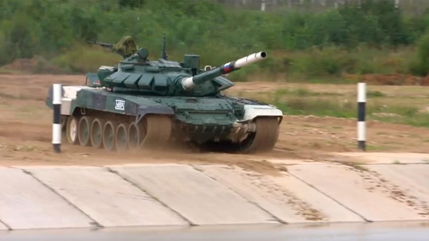 Kíp xe tăng số 1 của Nga thi đấu thành công ở chặng đua đầu tiên. Ảnh: TvZvezda. Kíp xe tăng số 1 của Nga thi đấu thành công ở chặng đua đầu tiên. Ảnh: TvZvezda.