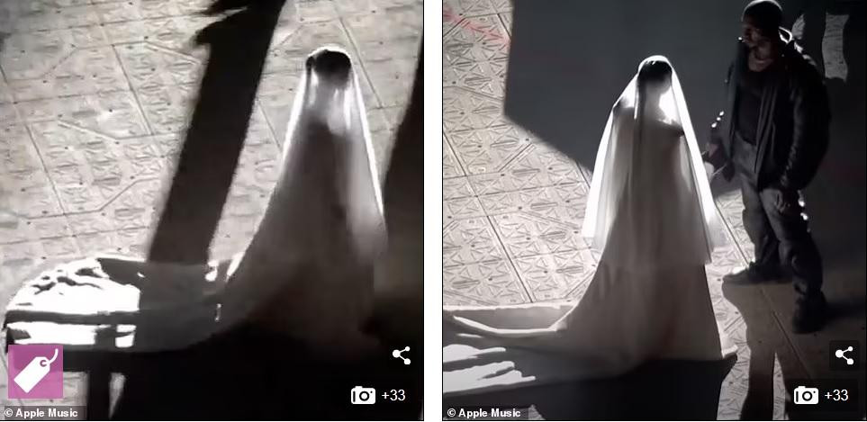 Kim xuất hiện trên sân khấu đêm diễn quan trọng của Kanye West. Kim xuất hiện trên sân khấu đêm diễn quan trọng của Kanye West.