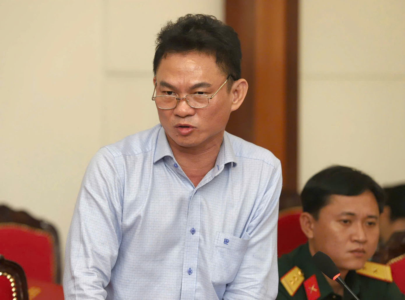 Ông Nguyễn Vinh Huy trao đổi ý kiến tại hội thảo.