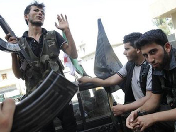 Quân nổi dậy ở Syria nói rằng họ đẩy lui quân chính phủ hôm 27-7. Ảnh: AP. Quân nổi dậy ở Syria nói rằng họ đẩy lui quân chính phủ hôm 27-7. Ảnh: AP