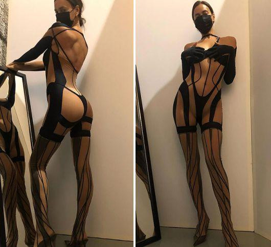 Irina Shayk gây chú ý khi diện bộ đồ bó sát toàn thân với thiết kế cắt xẻ chóng mặt dường như chỉ che được những bộ phận chính. Bộ trang phục có phần in đen trên nền vải màu da thịt xuyên thấu, tạo ảo giác quang học giống như một sợi chỉ đen trên cơ thể không mặc gì. Irina Shayk gây chú ý khi diện bộ đồ bó sát toàn thân với thiết kế cắt xẻ chóng mặt dường như chỉ che được những bộ phận chính. Bộ trang phục có phần in đen trên nền vải màu da thịt xuyên thấu, tạo ảo giác quang học giống như một sợi chỉ đen trên cơ thể không mặc gì.