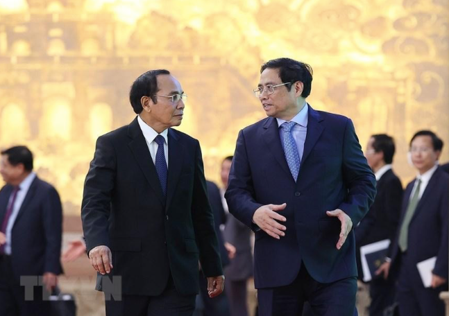 Thủ tướng Phạm Minh Chính với Thường trực Ban Bí thư, Phó Chủ tịch nước Lào Bounthong Chitmany. (Ảnh: TTXVN) Thủ tướng Phạm Minh Chính với Thường trực Ban Bí thư, Phó Chủ tịch nước Lào Bounthong Chitmany. (Ảnh: TTXVN)