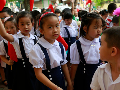 Học sinh Hà Nội trong ngày khai giảng năm học mới 2012. Ảnh: Hồng Vĩnh