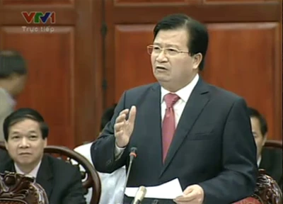 Bộ trưởng Bộ Xây dựng Trịnh Đình Dũng trong phiên giải trình sáng 24-1