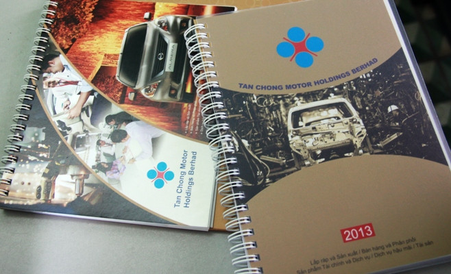 Bìa hai ấn phẩm in hình ảnh tập đoàn Tan Chong