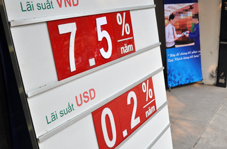 Ngân hàng tiếp tục hạ lãi suất tiết kiệm ảnh 1