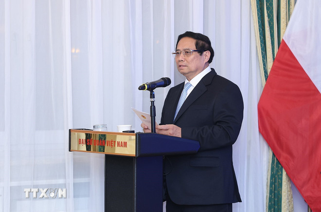 Thủ tướng Phạm Minh Chính phát biểu tại cuộc gặp cán bộ, nhân viên Đại sứ quán và cộng đồng người Việt Nam tại Cộng hòa Ba Lan. (Ảnh: Dương Giang/TTXVN). Thủ tướng Phạm Minh Chính phát biểu tại cuộc gặp cán bộ, nhân viên Đại sứ quán và cộng đồng người Việt Nam tại Cộng hòa Ba Lan. (Ảnh: Dương Giang/TTXVN).