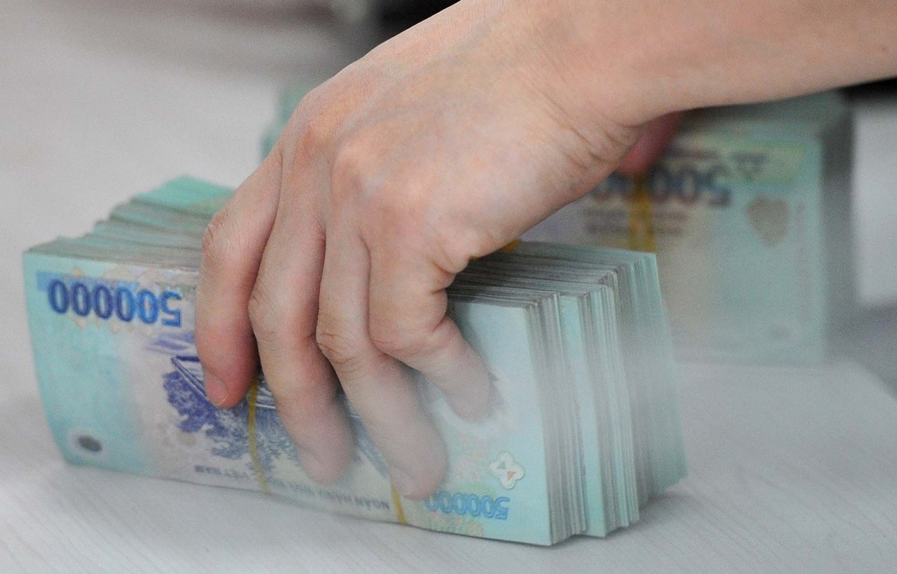 Người nộp thuế còn mất nhiều thời gian để nhận lại được tiền hoàn thuế thu nhập cá nhân. Ảnh minh hoạ: Hoàng Hà.