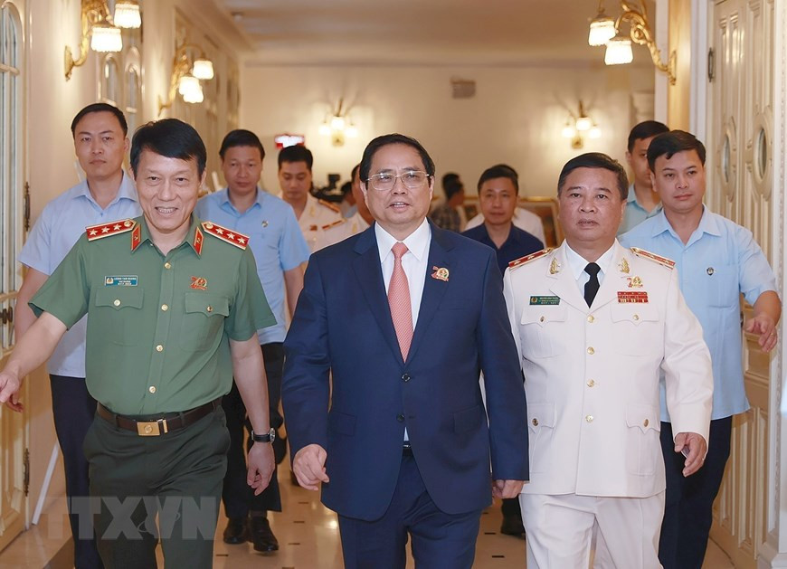 Thủ tướng Phạm Minh Chính tới dự Lễ kỷ niệm 70 năm Ngày truyền thống lực lượng An ninh Kinh tế. (Ảnh: Dương Giang/TTXVN)