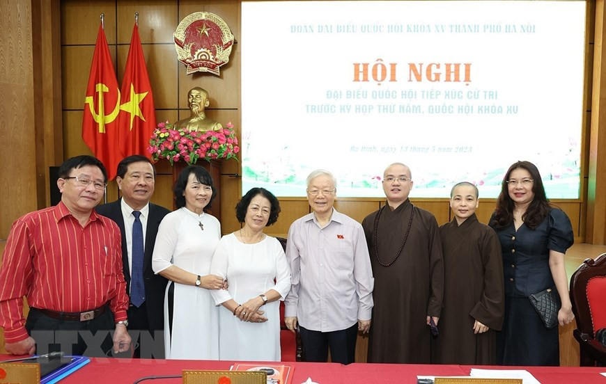 Tổng Bí thư Nguyễn Phú Trọng với cử tri tại quận Ba Đình. (Ảnh: Trí Dũng/TTXVN) Tổng Bí thư Nguyễn Phú Trọng với cử tri tại quận Ba Đình. (Ảnh: Trí Dũng/TTXVN)