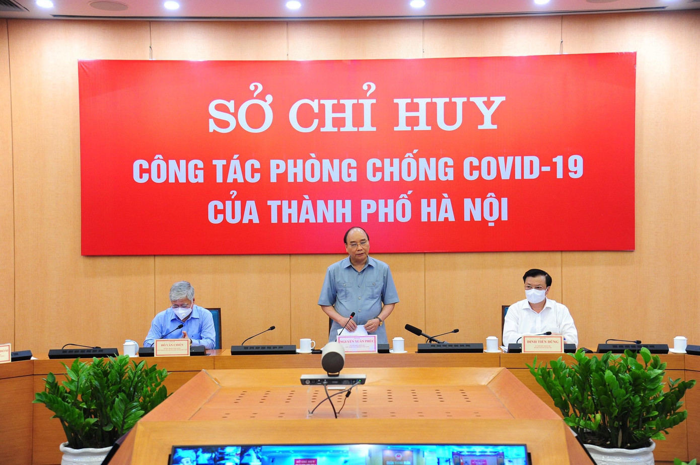 Chủ tịch nước Nguyễn Xuân Phúc làm việc với Sở Chỉ huy phòng, chống dịch COVID-19 thành phố Hà Nội. Ảnh: Nguyễn Thành