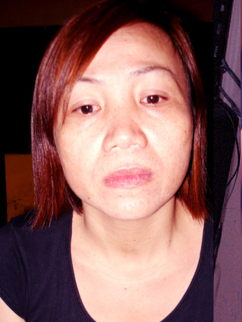 Má mì Đặng Thị Bình tại cơ quan điều tra