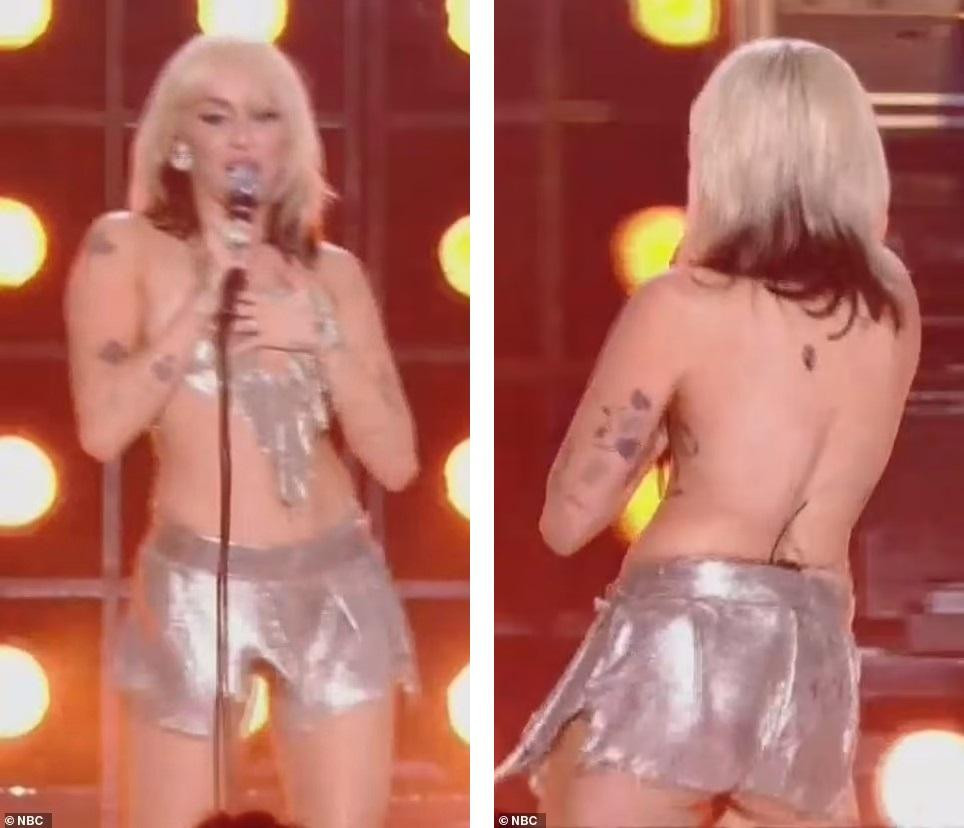 Tuy nhiên, chút sự cố không ảnh hưởng đến độ &quot;máu lửa&quot; của Miley. Cô vẫn tiếp tục biểu diễn trong lúc dùng tay che ngực.