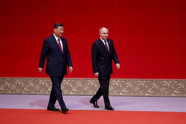 Tổng thống Nga Vladimir Putin và Chủ tịch Trung Quốc Tập Cận Bình. (Ảnh: Reuters)