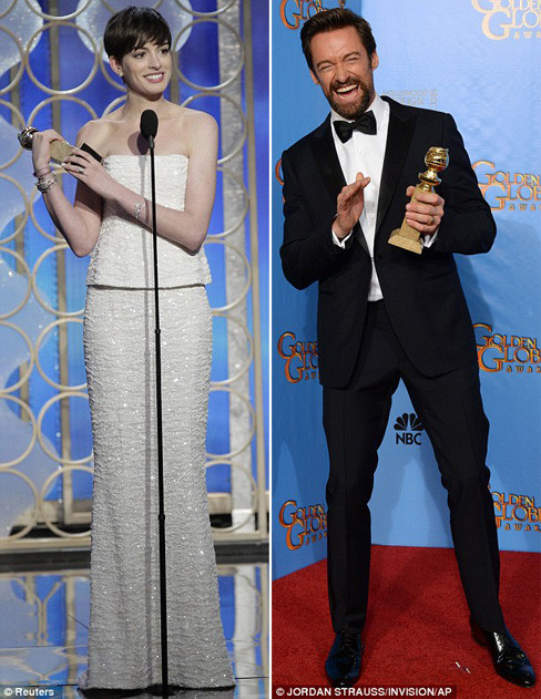 Anne Hathaway và Hugh Jackman sung sướng với giải thưởng của mình. Anne Hathaway và Hugh Jackman sung sướng với giải thưởng của mình