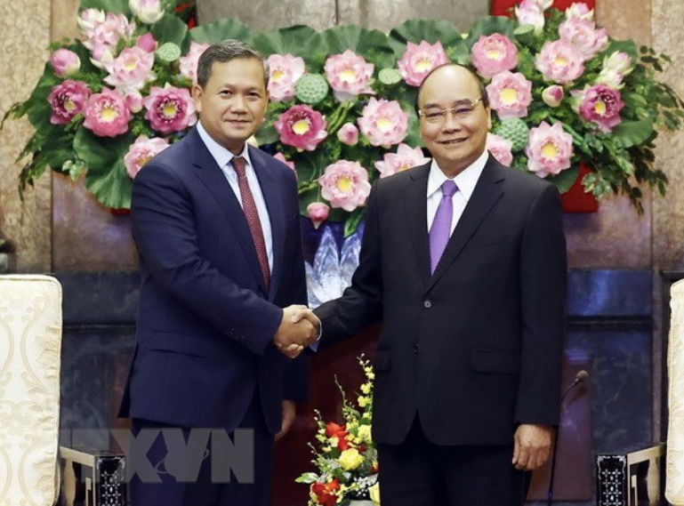 Chủ tịch nước Nguyễn Xuân Phúc tiếp Đại tướng Hun Manet. (Ảnh: TTXVN) Chủ tịch nước Nguyễn Xuân Phúc tiếp Đại tướng Hun Manet. (Ảnh: TTXVN)